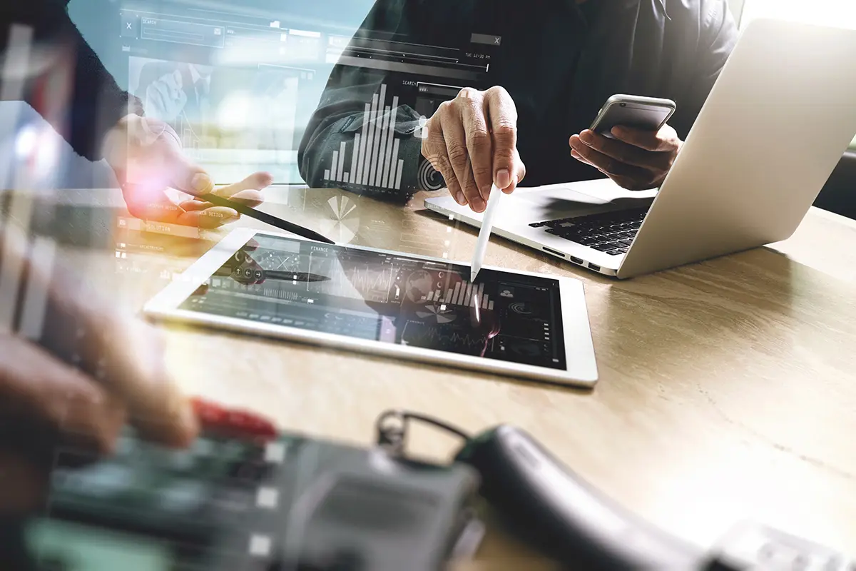 Business presentation using digital tablet, laptop computer and smart phone | Atlantic Finance Partners Limited